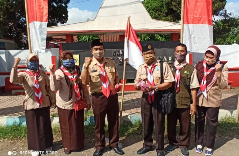 peringatan HUT Pramuka Yang Ke-59 Bagikan 500 Masker Kepada Masyarakat di Kecamatan Bangsalsari Kabupaten Jember