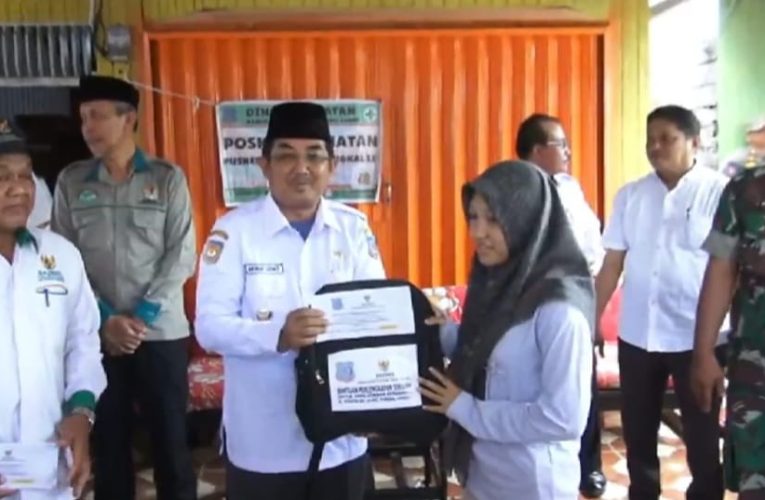 Bupati Serahkan Bantuan Korban Bencana Kebakaran di Tungkal Harapan