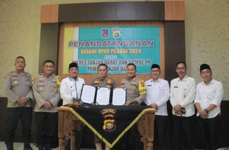 Bupati Saksikan Penandatanganan  NPHD Antara Polres dan Sat Pol-PP Tanjab Barat